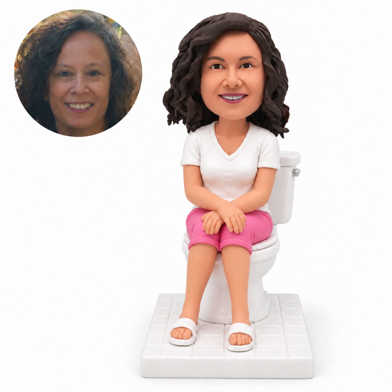 custom bobblehead figure woman in a T-shirt seated on a toilet