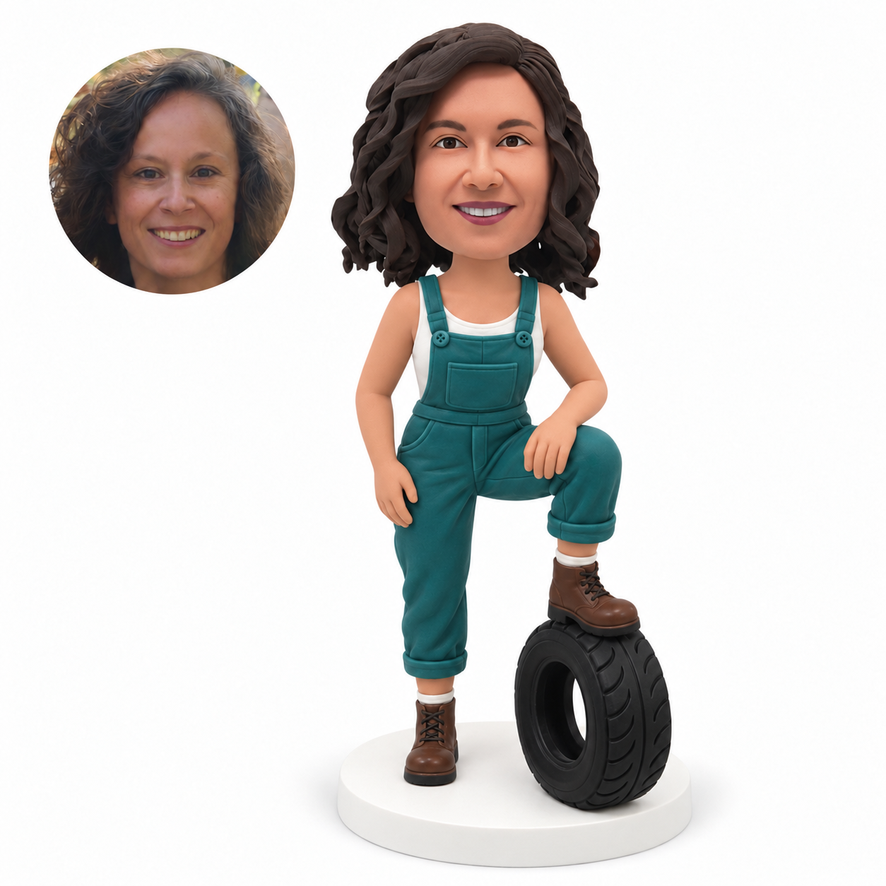 custom bobblehead figure female mechanic in bib overalls with one foot on a tire