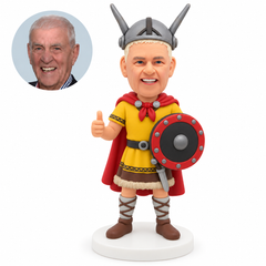 custom bobblehead figure man in a Viking outfit with a cape and round shield