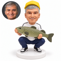 custom bobblehead figure fisherman in a full squat holding a large fish with both hands