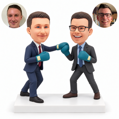 Two businessmen facing one another in a friendly boxing sparring pose, with four teal gloves.