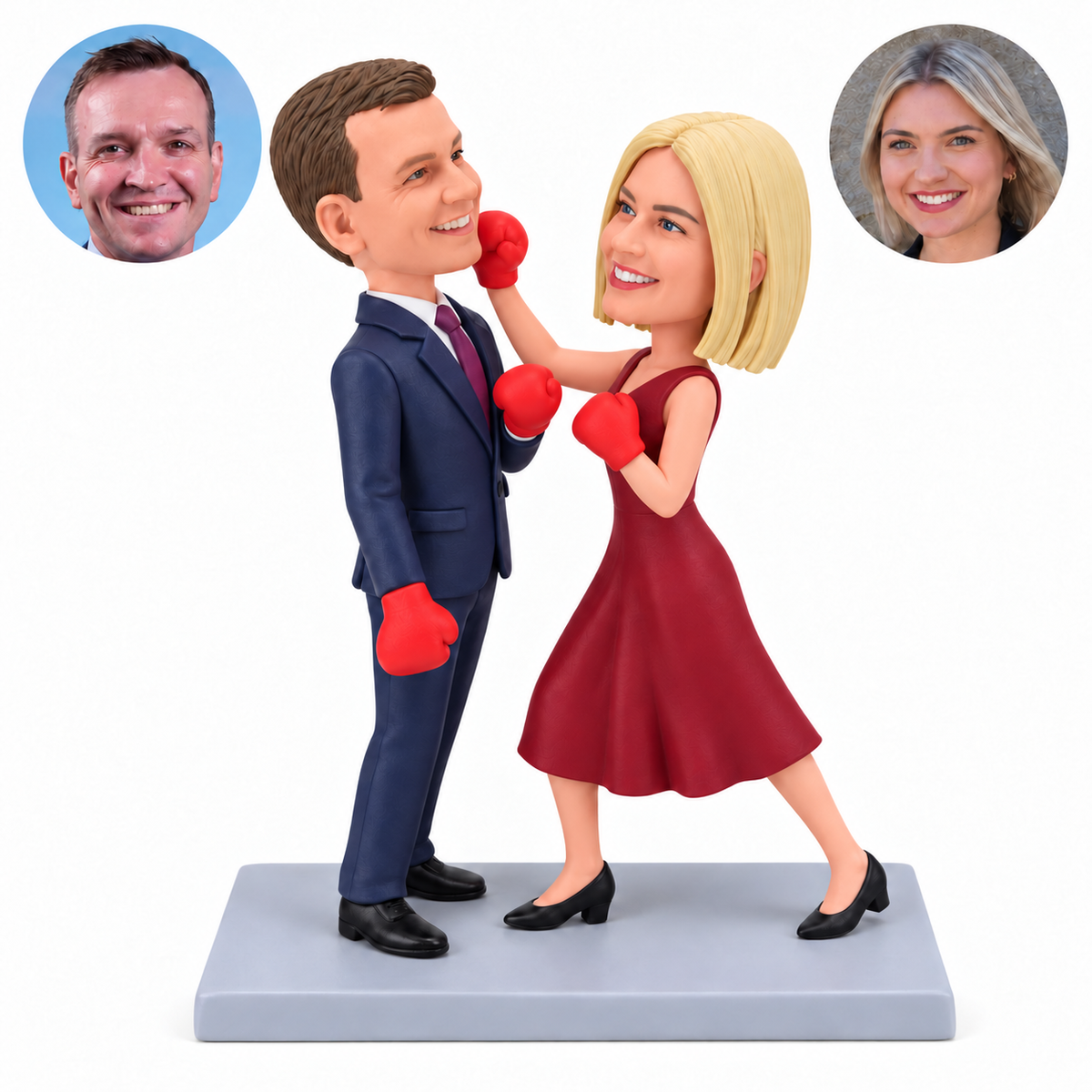 custom bobblehead figures formal couple playfully sparring with red boxing gloves