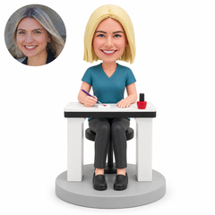 custom bobblehead figure female nail technician seated at a manicure table with polish