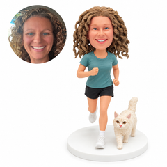 Custom female runner bobblehead jogging with a fixed cream cat beside her