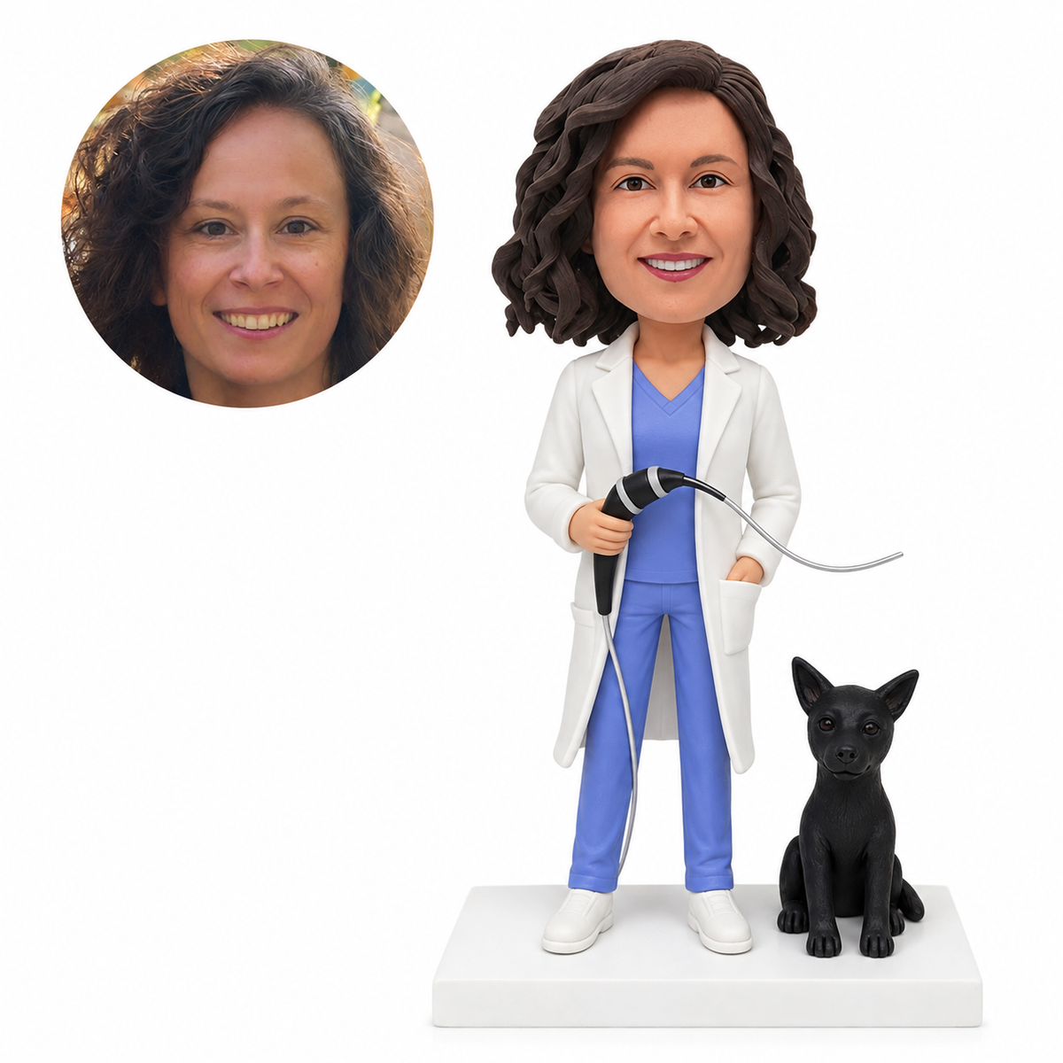 Custom female doctor bobblehead holding an endoscope beside a fixed black dog