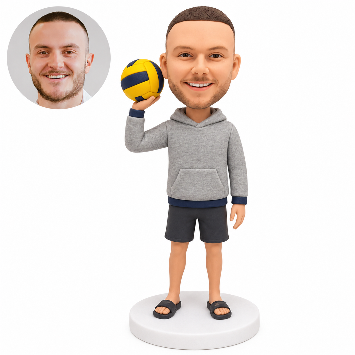 Custom water polo figure in gray hoodie and shorts holding a water polo ball near his shoulder