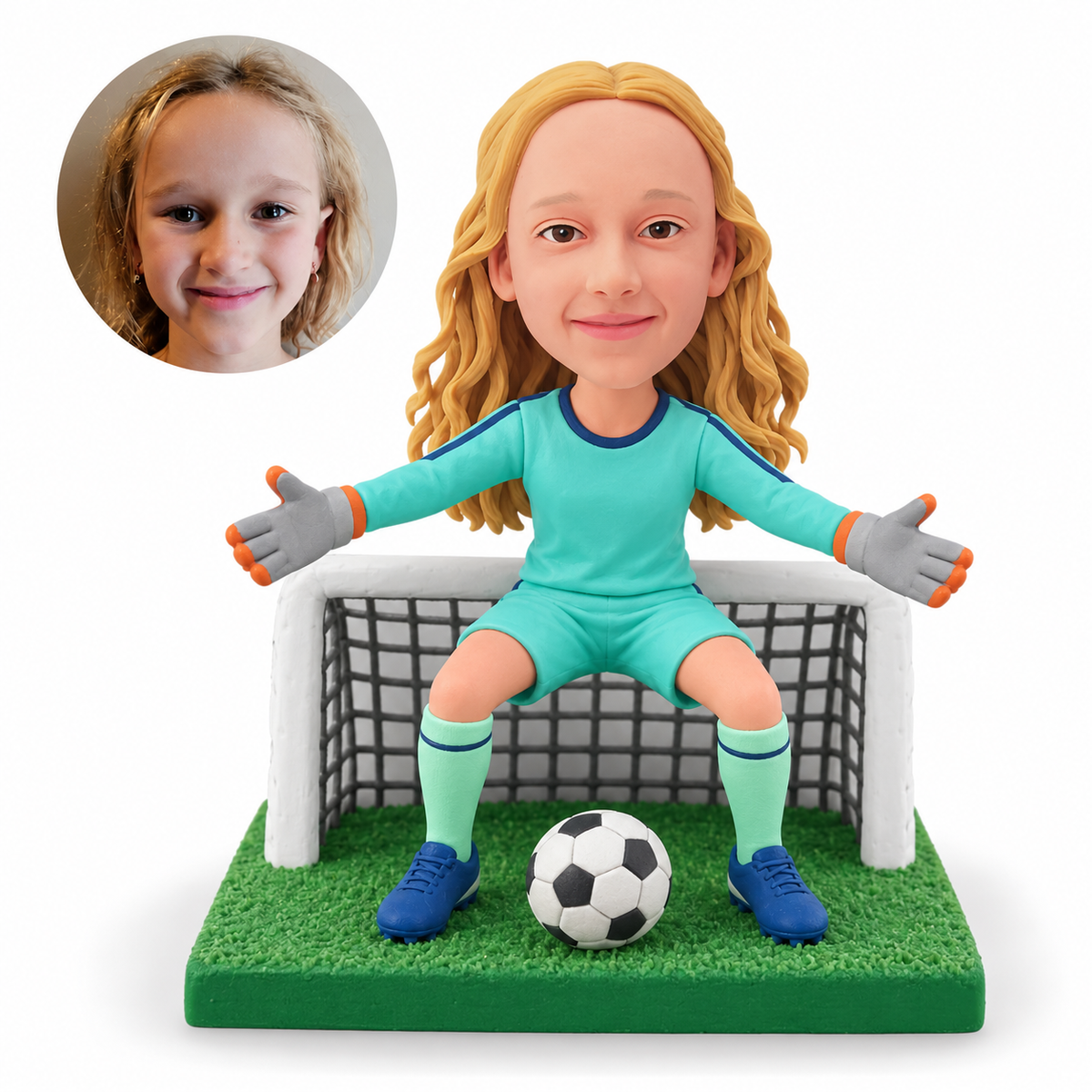 Young girl soccer goalkeeper bobblehead seated before a goal with arms spread and ball between her feet