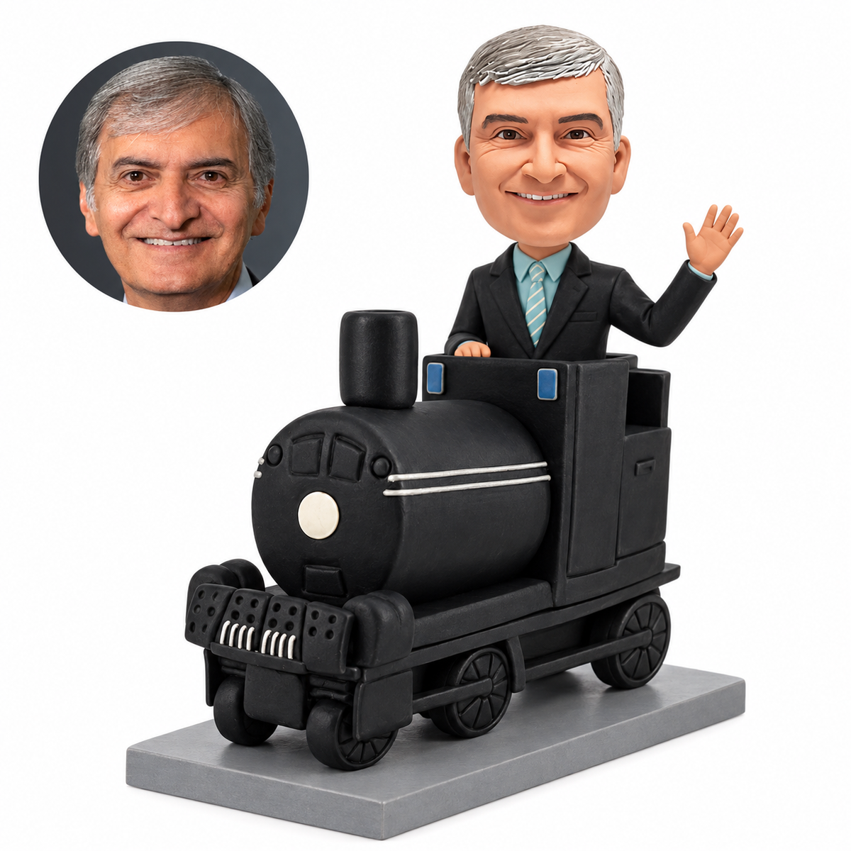 Custom bobblehead figure waving from miniature black steam locomotive