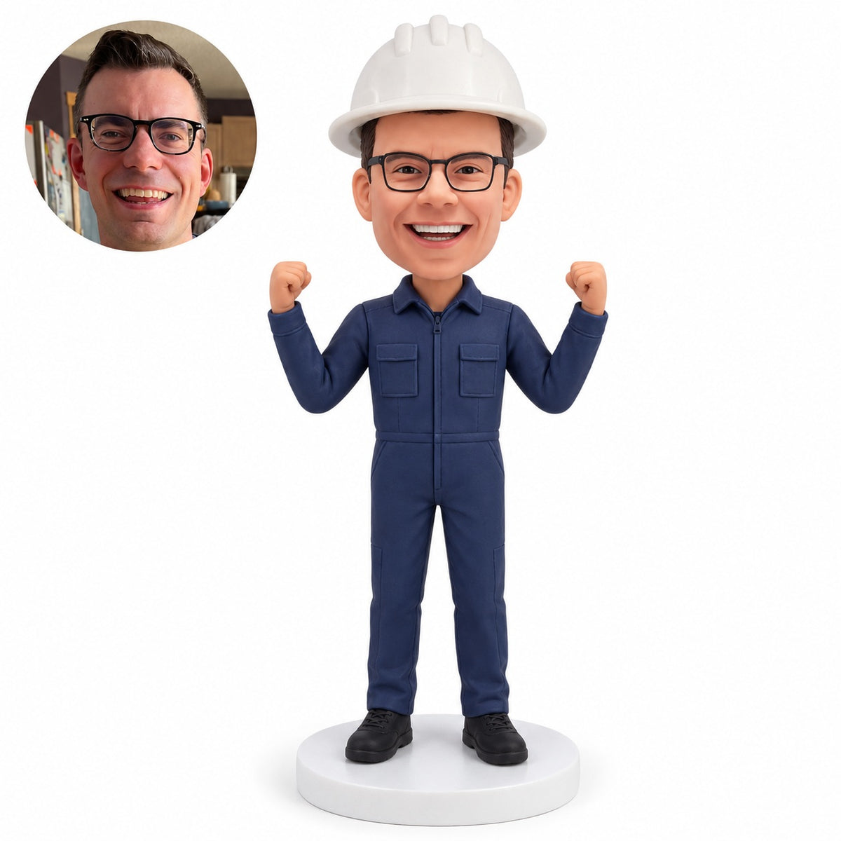 Custom engineer bobblehead in navy coveralls with both fists raised and white hardhat