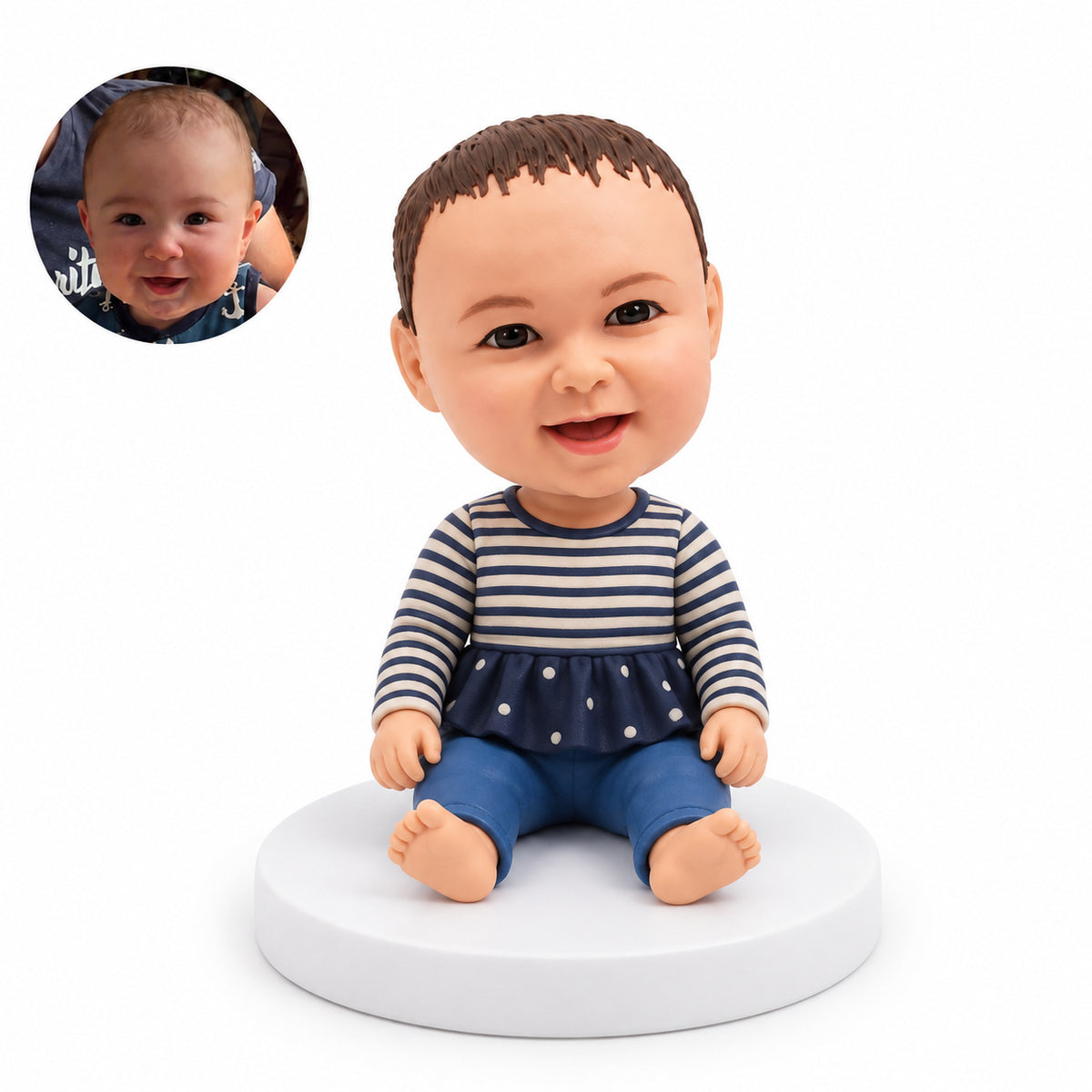 Custom baby bobblehead seated in a striped peplum top and blue pants