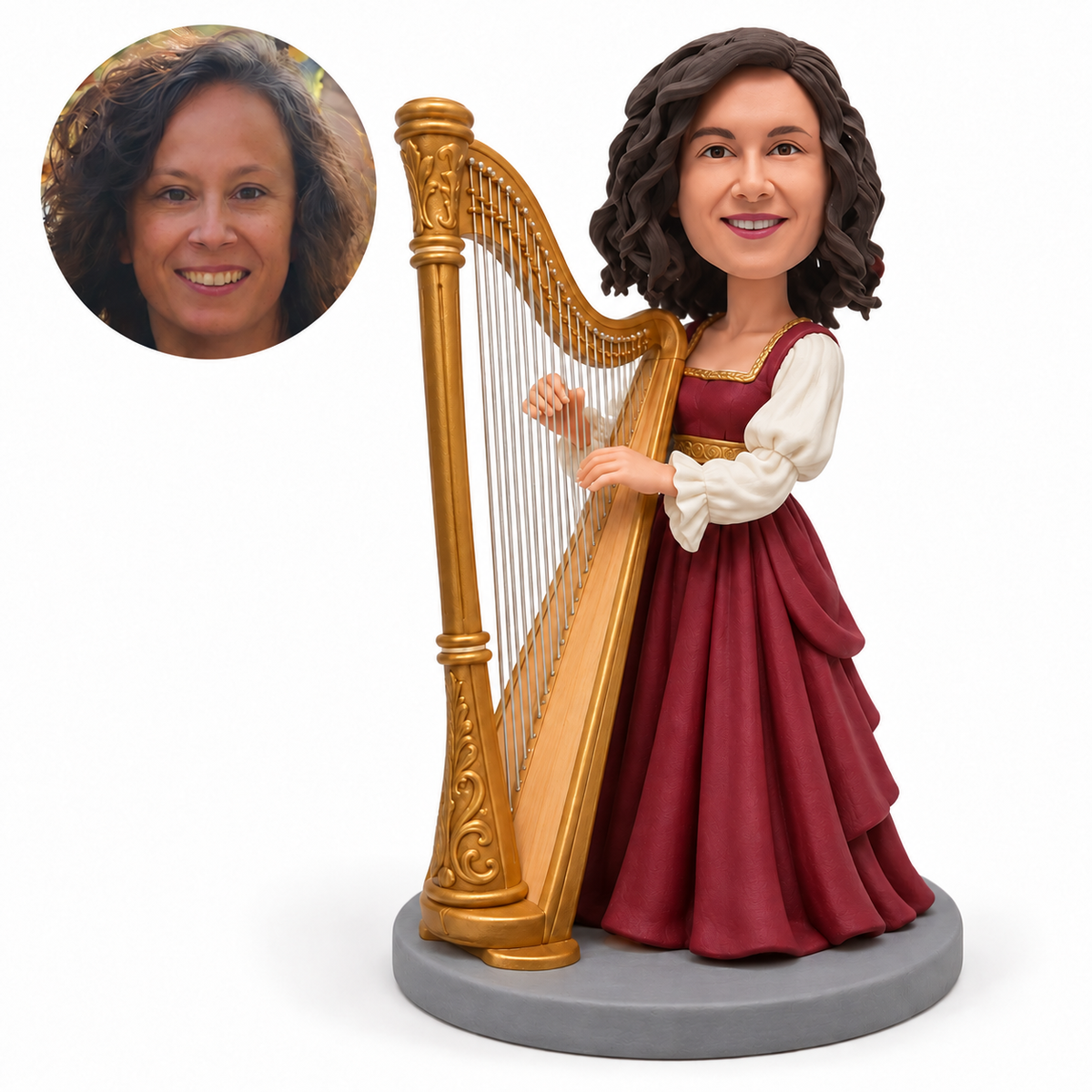 Custom female harpist bobblehead playing a tall golden harp in a burgundy dress