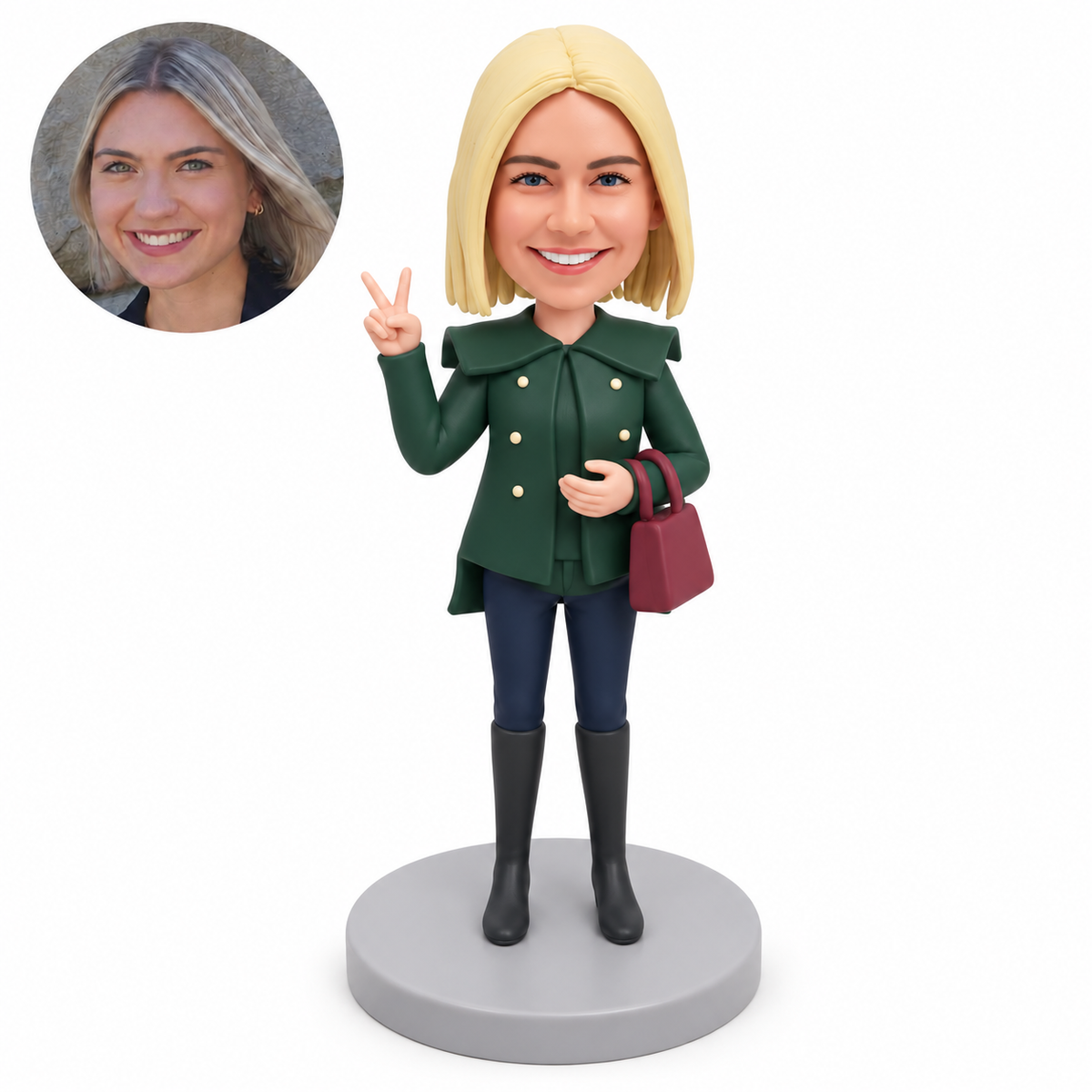 custom bobblehead figure woman in a capelet coat making a peace sign with a handbag on her other forearm