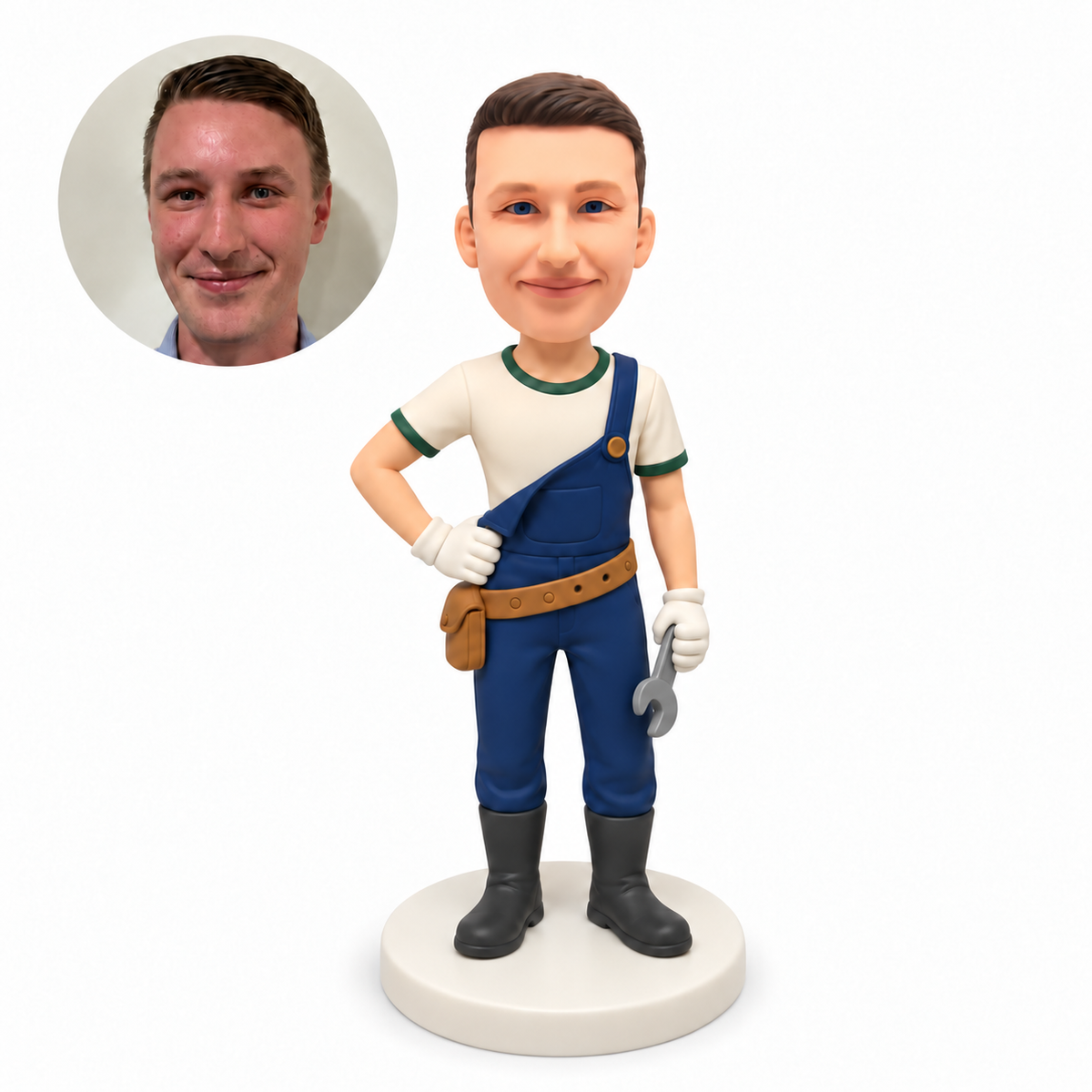 custom bobblehead figure male repair worker in one strap overalls holding a lowered wrench with his other hand on his hip
