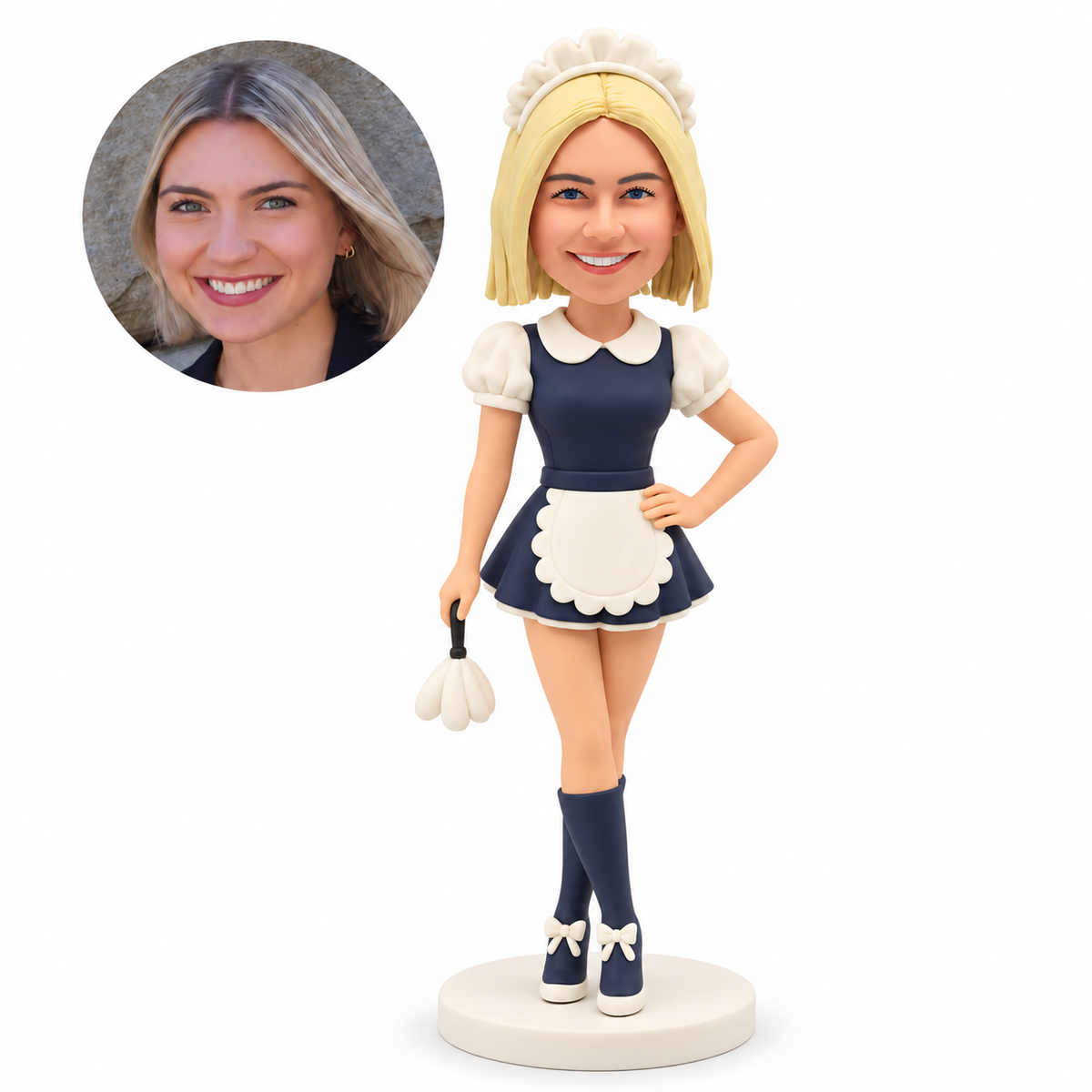 custom bobblehead figure female in a maid costume holding a feather duster with one hand on her hip