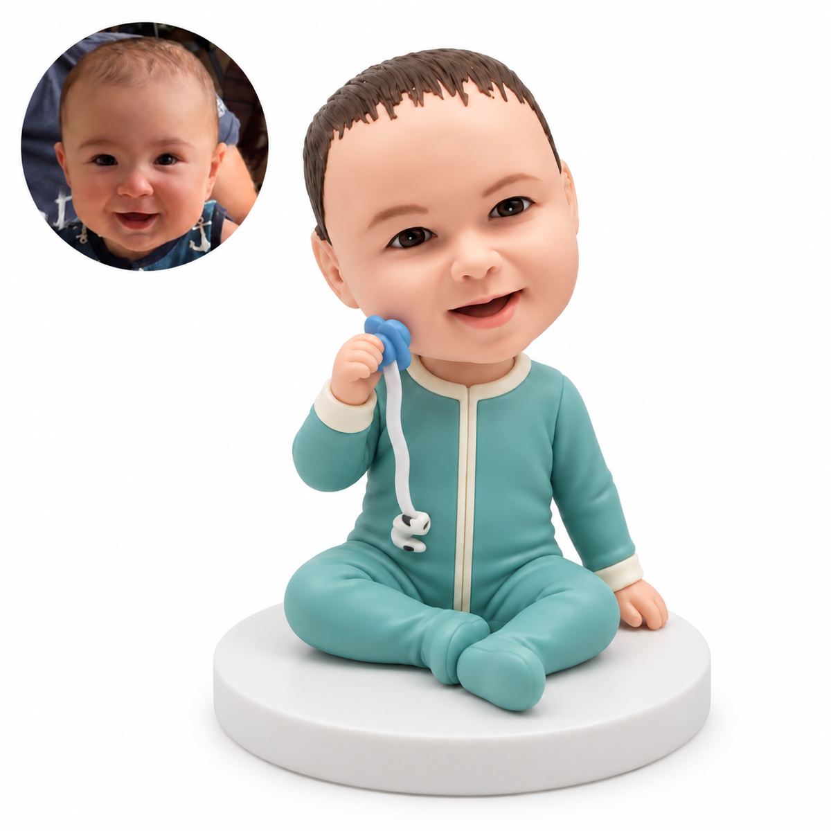 custom bobblehead figure baby seated cross-legged holding a pacifier with a tether
