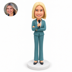 custom bobblehead figure female news reporter in a pantsuit holding a microphone with one arm folded
