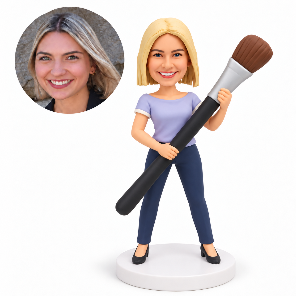 custom bobblehead figure woman holding an oversized paintbrush diagonally with both hands