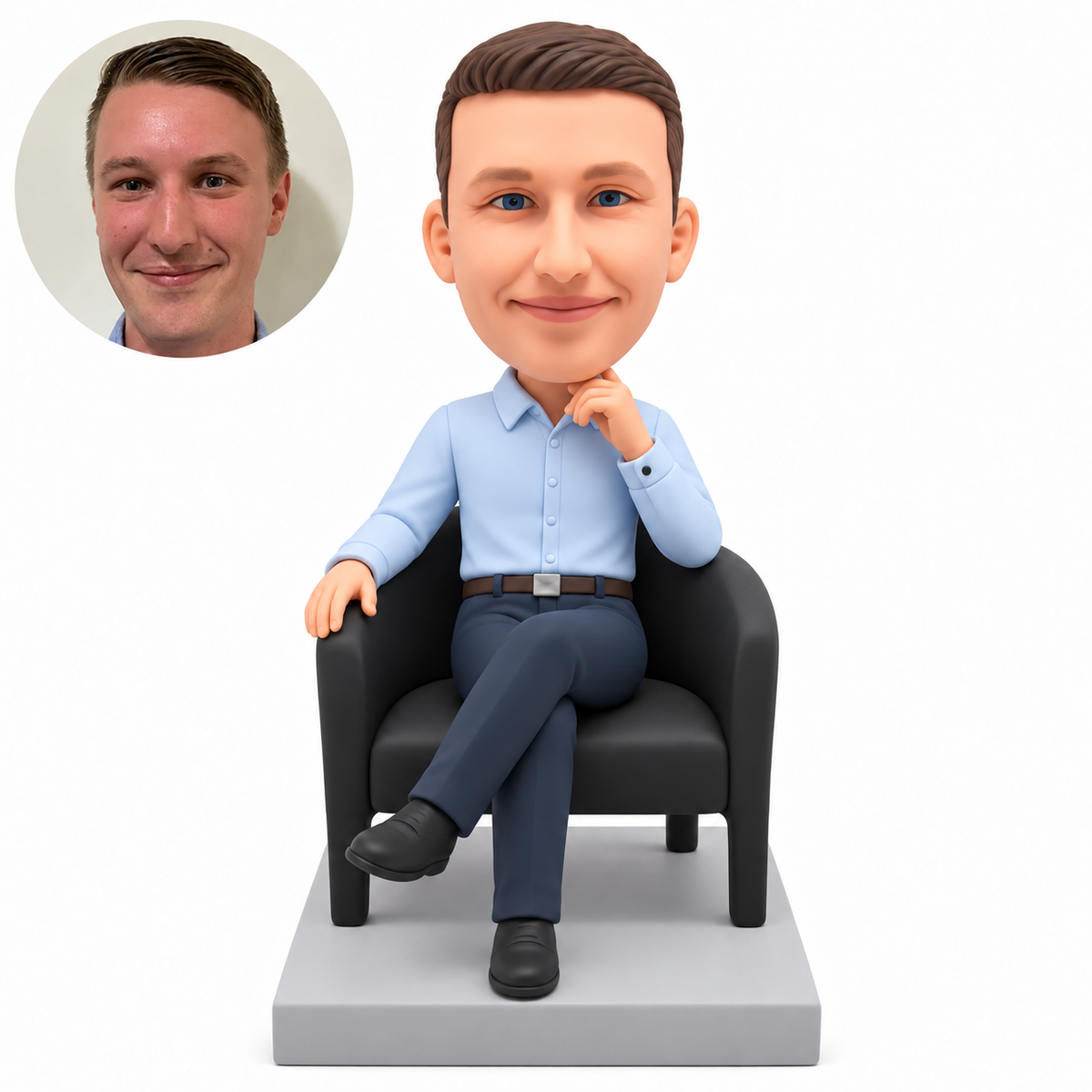 custom bobblehead figure man seated in an armchair with crossed legs and one hand at his chin
