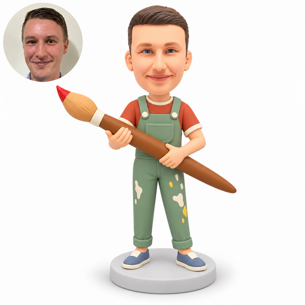 custom bobblehead figure male painter holding a giant paintbrush across his body with both hands