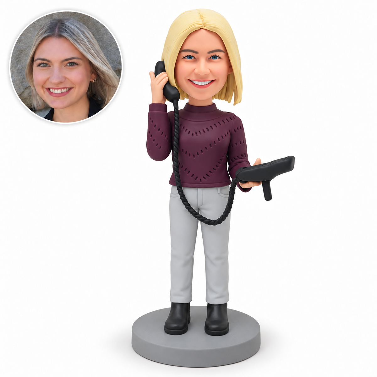 custom bobblehead figure woman holding a corded telephone receiver to her right ear with the base in her left hand