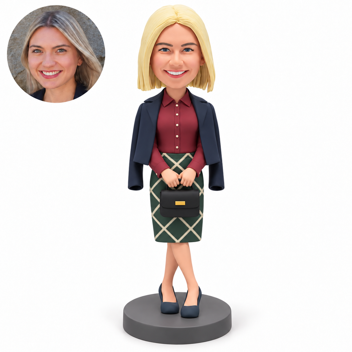 custom bobblehead figure businesswoman with a jacket draped over her shoulders holding a handbag with both hands