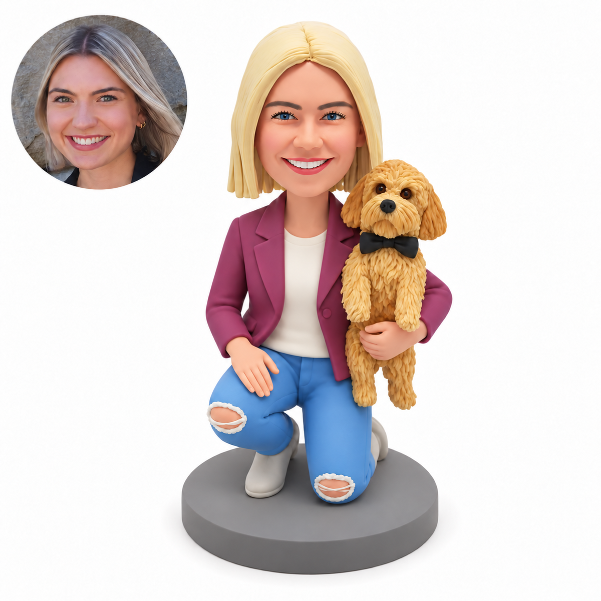 custom bobblehead figure woman kneeling with a small dog upright in her left arm and her right hand on her thigh