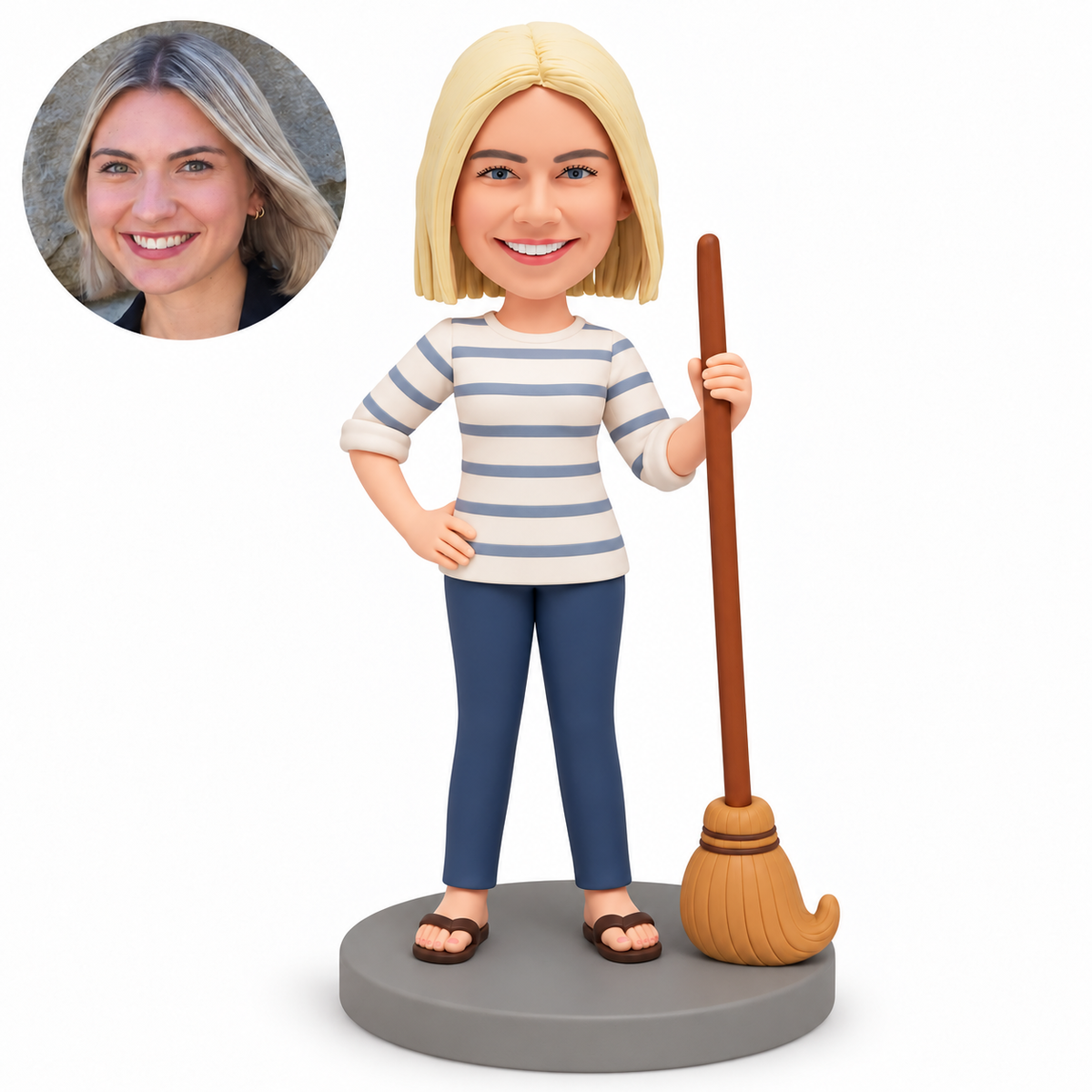 custom bobblehead figure woman holding an upright broom with one hand on her hip