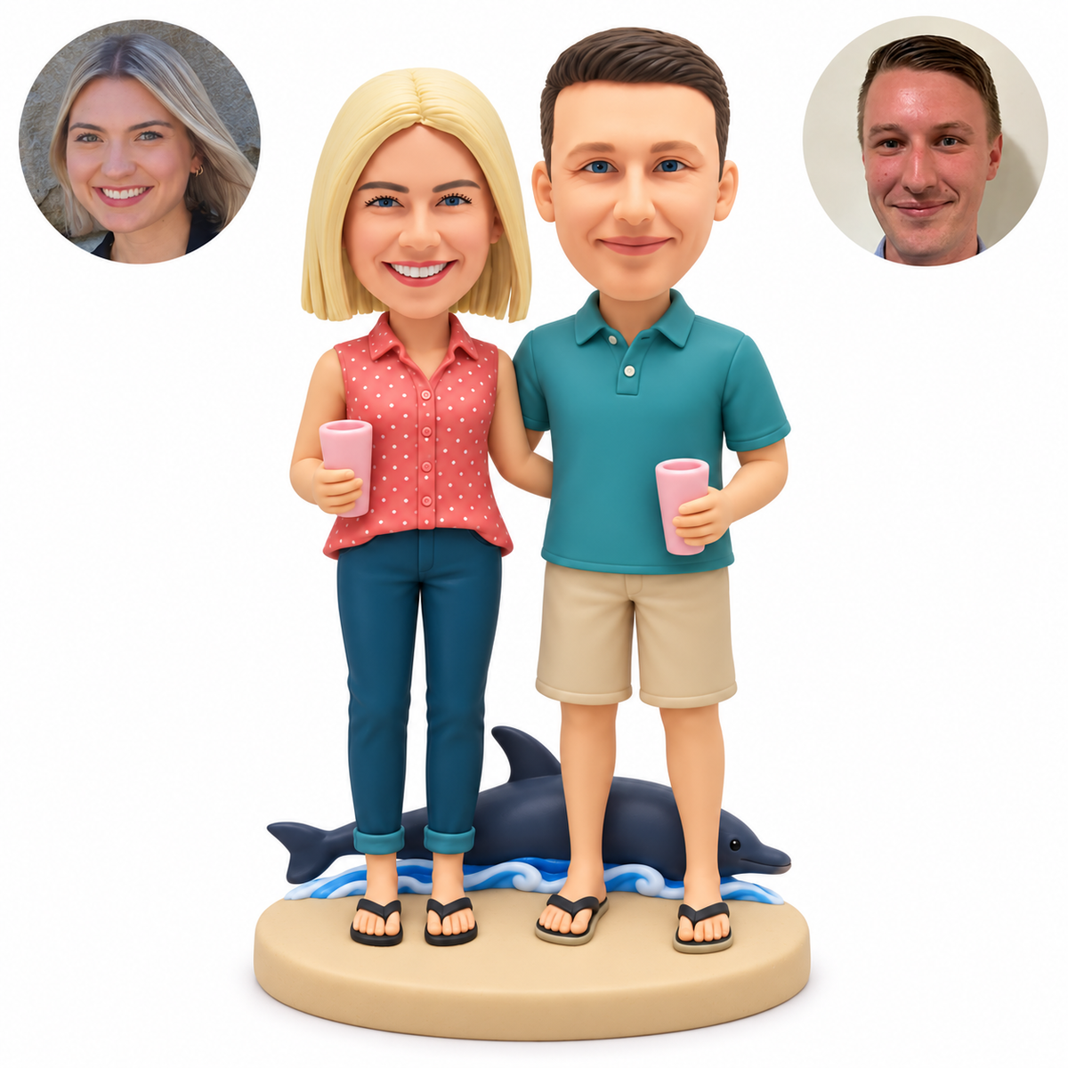 custom bobblehead figures beach couple holding cups beside a dolphin on a sand base