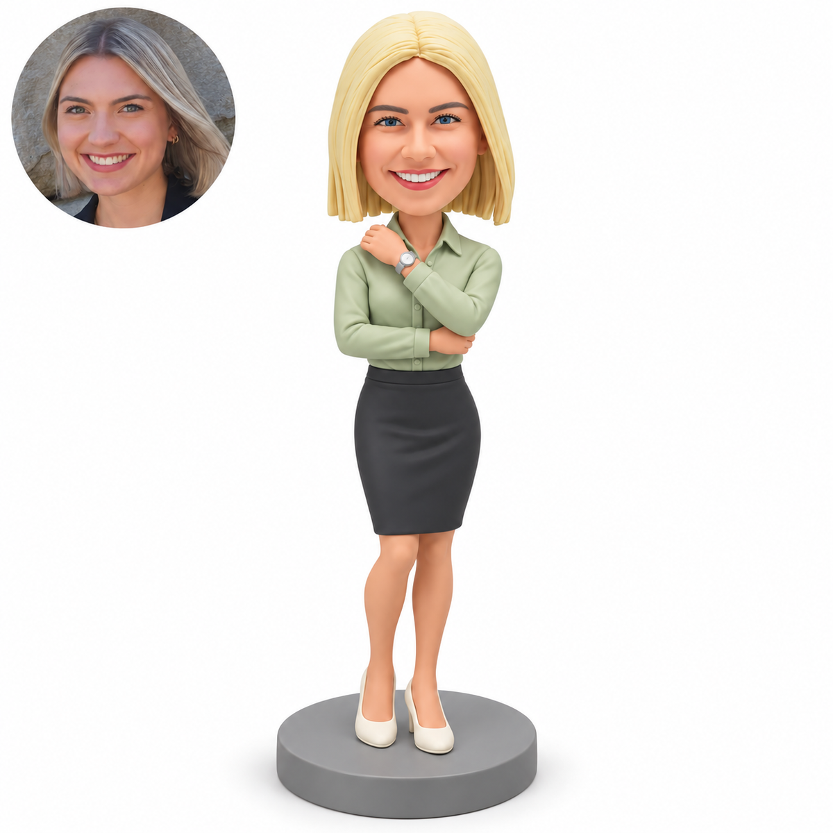 custom bobblehead figure businesswoman in a blouse and pencil skirt with one hand near her collar