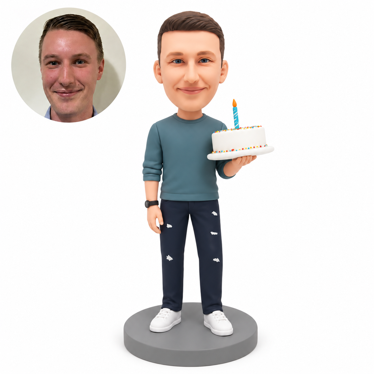 custom bobblehead figure male in a sweatshirt holding a birthday cake in his left hand with his right arm relaxed