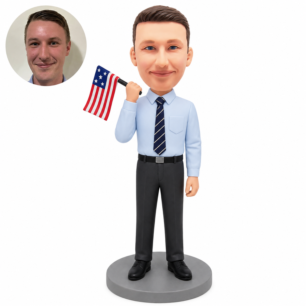 custom bobblehead figure male in a shirt and tie holding a small American flag near his right shoulder with his left arm down