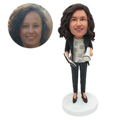 personalised bobblehead figure female boss holding a clipboard and a megaphone
