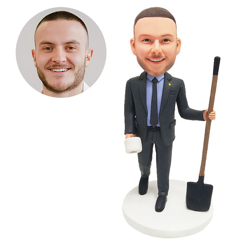 custom bobble head figure male boss holding a shovel and a roll paper