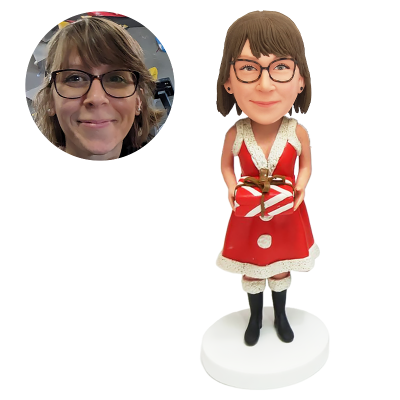 personalized bobblehead figure Christmas Santa lady holding a gift