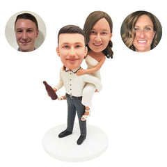 personalized piggyback bobbleheads figures couple man carrying woman on back with a beer