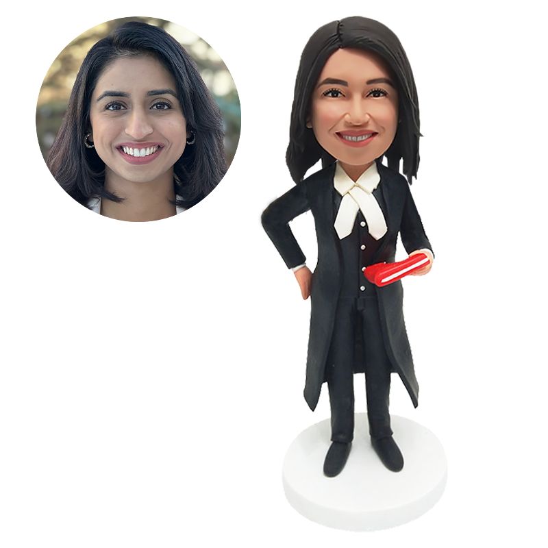 personalised bobblehead figure lawyer holding a book with one hand on the hip