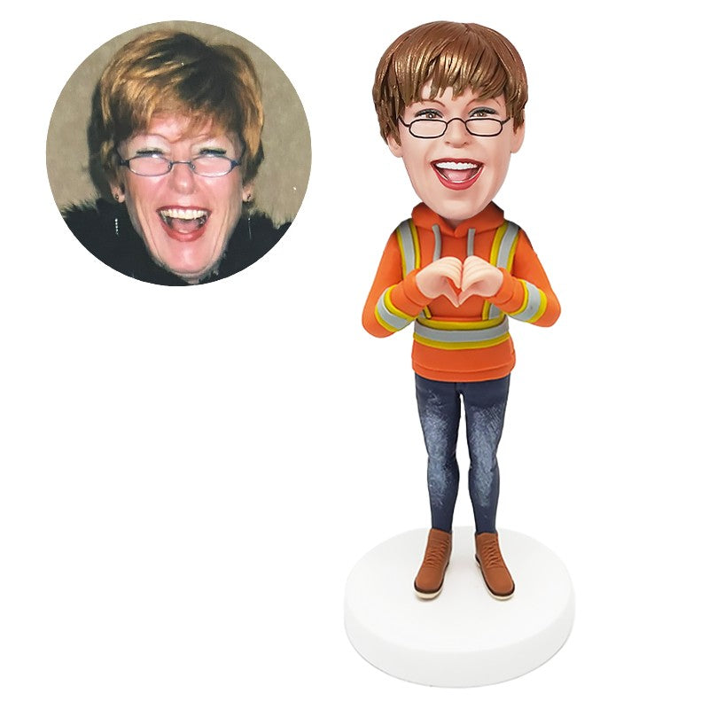 custom bobblehead figure female construction worker making love heart gesture
