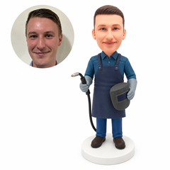 custom bobblehead figure welder holding a torch and face shield