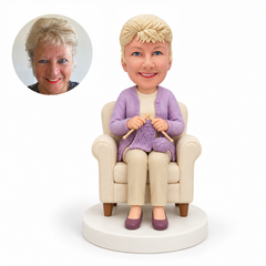custom bobblehead figure older woman knitting in an armchair