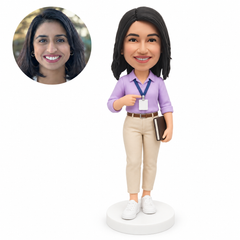 custom bobblehead figure female employee with a name badge and notebook