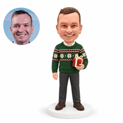 custom bobblehead figure man in a Christmas sweater holding a gift box