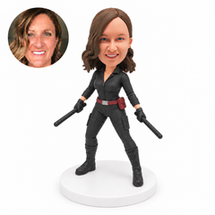 custom bobblehead figure woman in a black tactical suit holding two batons