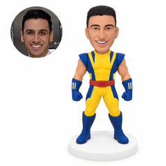 custom bobblehead figure man in a yellow and blue suit with silver gauntlet trim
