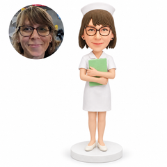 custom bobblehead figure nurse holding a medical chart in a dress