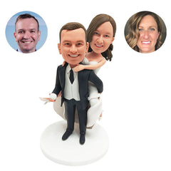 personalized bobble heads figures piggyback wedding couple carrying the bride