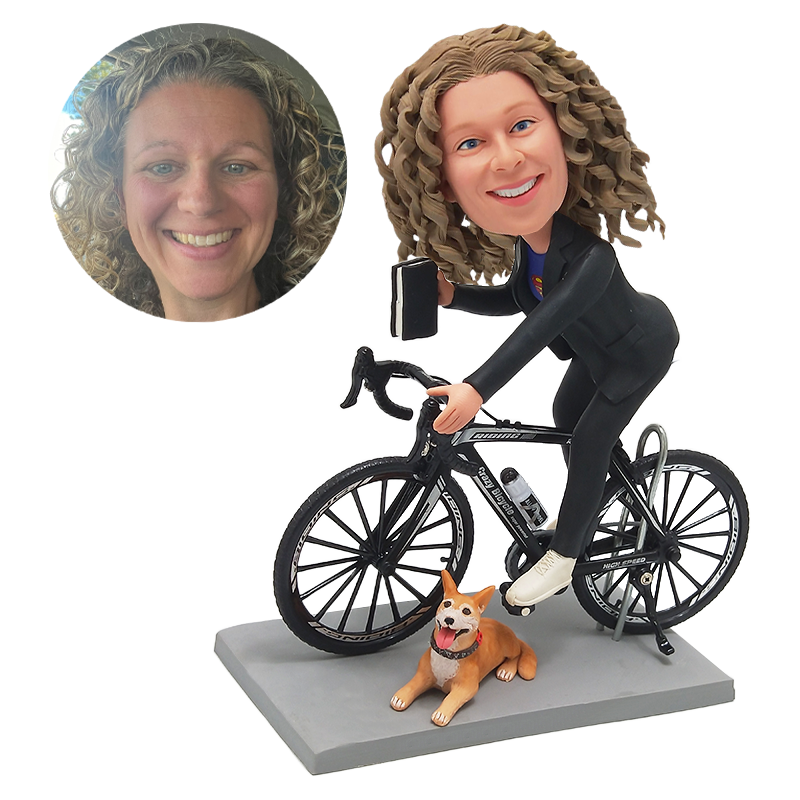 custom made bobblehead figure woman riding a bicycle with a pet