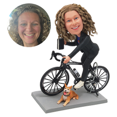 custom made bobblehead figure woman riding a bicycle with a pet
